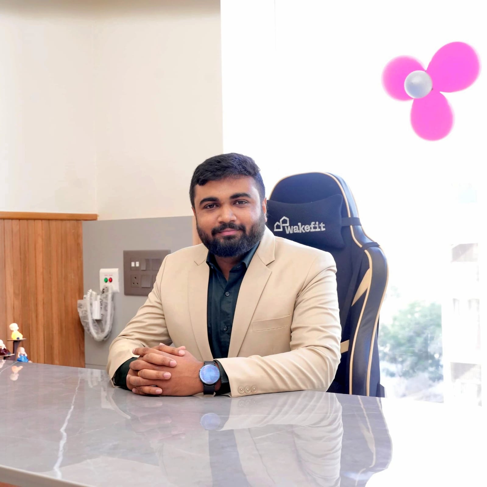 Professional headshot of a friendly doctor